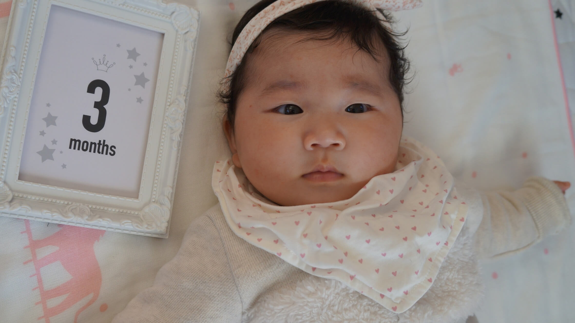 baby resting in crib